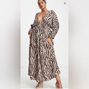 ASOS DESIGN Curve ruched long sleeve plunge beach maxi dress in animal print